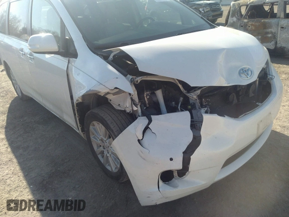 2014 Toyota Sienna XLE with VIN 5TDYK3DC3ES491381, listed as a IAAI auction lot 41803362 with 253,940 mi miles. Bid and sale history available at carsss.com. Image 6.