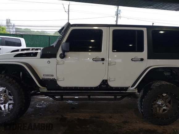 2012 Jeep Wrangler Unlimited Sport с VIN 1C4BJWDG8CL183831, выставлен на аукционе IAAI как лот 42343612 с пробегом 166 847 миль миль и . История ставок и продаж доступна на DreamBid. Изображение 15.