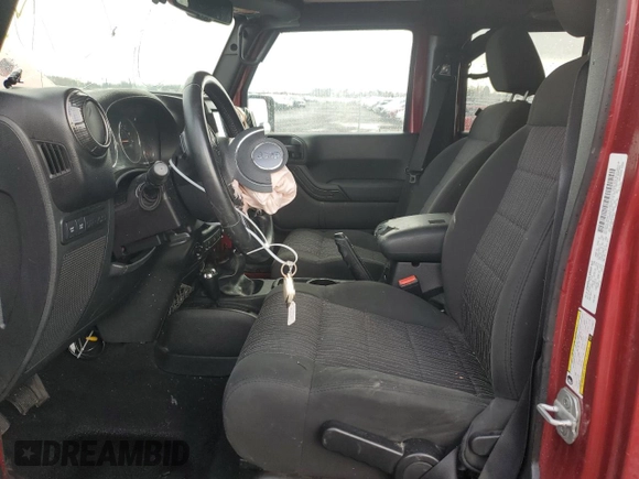 2012 Jeep Wrangler Unlimited Rubicon with VIN 1C4HJWFG2CL219021, listed as a Copart auction lot 87451784 with 109,675 mi miles and Salvage title. Bid and sale history available at DreamBid. Image 7.
