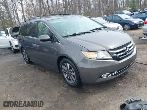 2014 Honda Odyssey Touring with VIN 5FNRL5H94EB020257, listed as a IAAI auction lot 41924245 with 204,526 mi miles and . Bid and sale history available at DreamBid. Image 1.