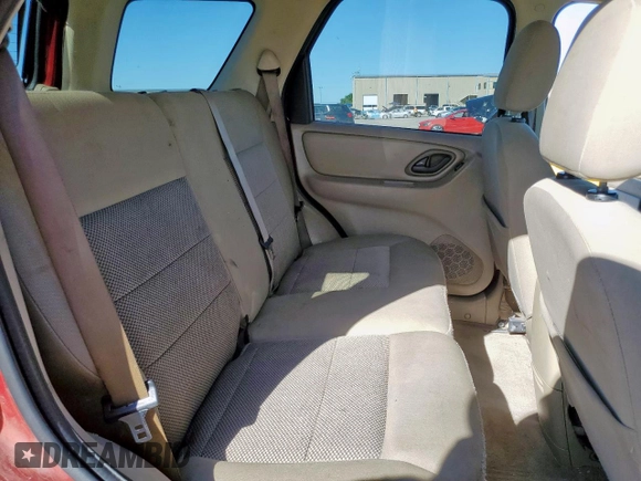 2005 Ford Escape XLT z VIN 1FMYU93185KE31449, wystawiony jako Copart lot #57763225 z przebiegiem 249 819 mil mil oraz Szkoda całkowita • Salvage title. Historia ofert i sprzedaży dostępna na DreamBid. Obrazek 11.