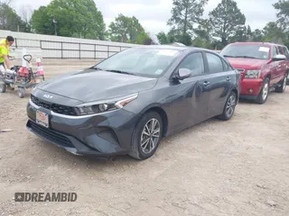 2023 Kia Forte LXS with VIN 3KPF24AD3PE566815, listed as a IAAI auction lot 41922482 with 20,790 mi miles and . Bid and sale history available at DreamBid. Image 2.
