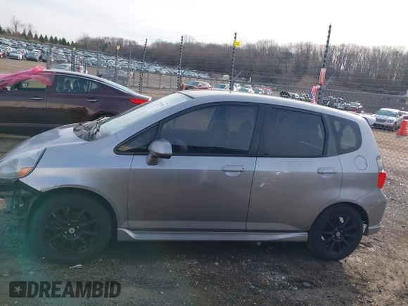 2007 Honda Fit Sport with VIN JHMGD376X7S065787, listed as a IAAI auction lot 41855058 with 218,865 mi miles. Bid and sale history available at carsss.com. Image 15.