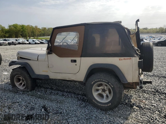 1995 Jeep Wrangler S with VIN 1J4FY19P0SP267541, listed as a Copart auction lot 48353564 with 153,985 mi miles and Salvage Title. Bid and sale history available at carsss.com. Image 2.