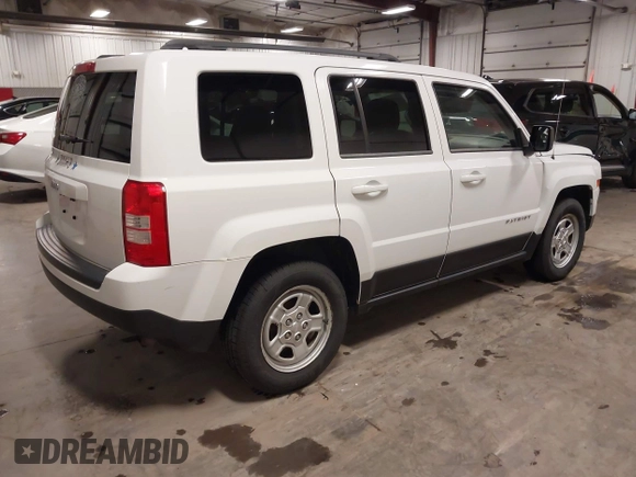 2014 Jeep Patriot Sport with VIN 1C4NJPBA6ED563281, listed as a IAAI auction lot 42392464 with 144,880 mi miles and . Bid and sale history available at DreamBid. Image 4.