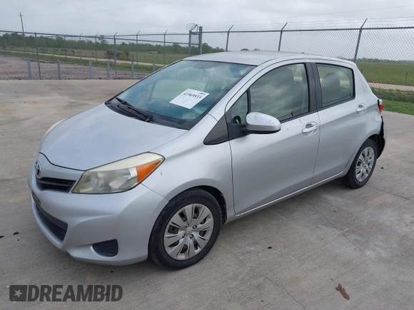 2013 Toyota Yaris L with VIN JTDKTUD32DD542761, listed as a IAAI auction lot 41969533 with 123,281 mi miles. Bid and sale history available at carsss.com. Image 2.
