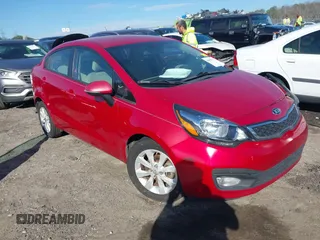 2014 Kia Rio EX with VIN KNADN4A35E6355797, listed as a IAAI auction lot 41639623 with 152,057 mi miles. Bid and sale history available at carsss.com. Image 1.