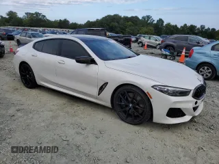2020 BMW 8 Series M850i with VIN WBAGV8C02LCE26317, listed as a Copart auction lot 66147384 with 60,037 mi miles and Salvage Title. Bid and sale history available at carsss.com. Image 4.