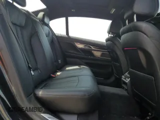 2019 BMW 7 Series 740i xDrive z VIN WBA7E4C56KGV71028, wystawiony jako Copart lot #76860474 z przebiegiem 66 657 mil mil oraz Nie do naprawy • Non repairable. Historia ofert i sprzedaży dostępna na DreamBid. Obrazek 11.