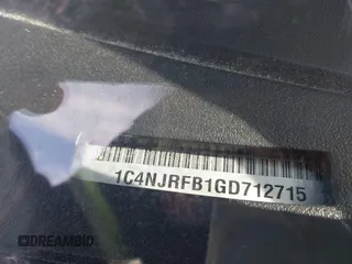 2016 Jeep Patriot High Altitude Edition with VIN 1C4NJRFB1GD712715, listed as a IAAI auction lot 41984245 with 124,227 mi miles. Bid and sale history available at carsss.com. Image 9.