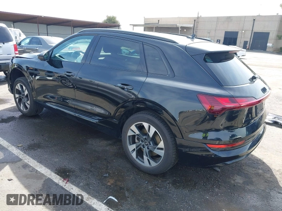 2022 Audi e-tron Premium with VIN WA1AAAGE6NB027461, listed as a IAAI auction lot 41830461 with 25,727 mi miles. Bid and sale history available at carsss.com. Image 3.