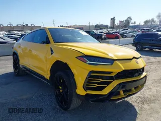 2019 Lamborghini Urus z VIN ZPBUA1ZL1KLA02206, wystawiony jako IAAI lot #41998678 z przebiegiem 52 893 mil mil oraz . Historia ofert i sprzedaży dostępna na DreamBid. Obrazek 1.