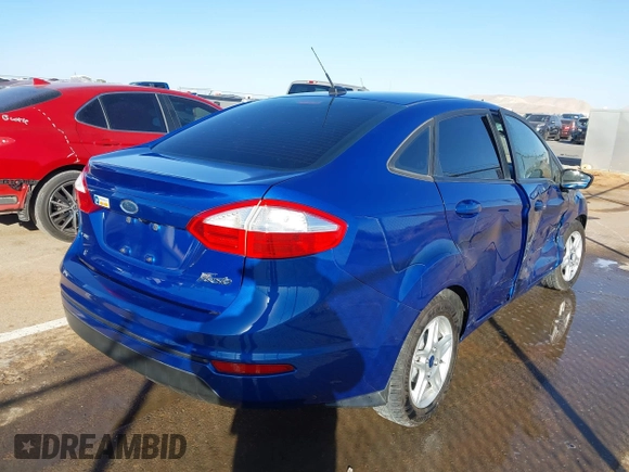 2018 Ford Fiesta SE with VIN 3FADP4BJ2JM124737, listed as a IAAI auction lot 41355279 with 95,470 mi miles. Bid and sale history available at carsss.com. Image 4.