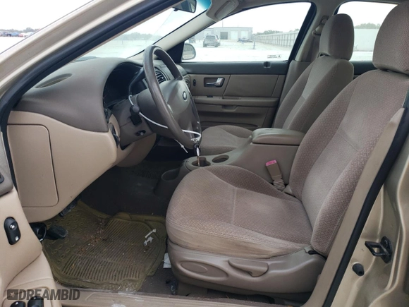 2001 Ford Taurus LX with VIN 1FAFP52U51A145880, listed as a Copart auction lot 77084934 with 54,143 mi miles and Salvage Title. Bid and sale history available at carsss.com. Image 7.
