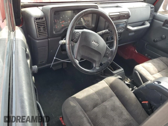 2006 Jeep Wrangler Sport z VIN 1J4FA49S86P754812, wystawiony jako Copart lot #56543395 z przebiegiem 192 851 mil mil oraz Szkoda całkowita • Salvage title. Historia ofert i sprzedaży dostępna na DreamBid. Obrazek 8.