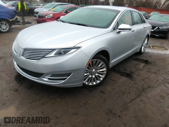 2013 Lincoln MKZ with VIN 3LN6L2JKXDR811822, listed as a IAAI auction lot 42009690 with 128,405 mi miles. Bid and sale history available at carsss.com. Image 2.