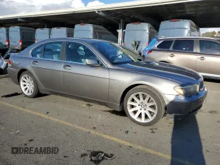 2002 BMW 7 Series 745i with VIN WBAGL63462DP57016, listed as a Copart auction lot 81025594 with 121,870 mi miles and Salvage Title. Bid and sale history available at DreamBid. Image 4.