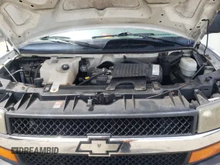 2005 Chevrolet Express Cargo with VIN 1GCFG15T051142218, listed as a Copart auction lot 57409005 with 185,725 mi miles and Salvage title. Bid and sale history available at DreamBid. Image 12.