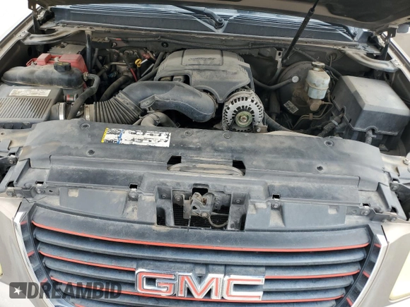 2007 GMC Yukon XL SLT z VIN 1GKFK163X7R327673, wystawiony jako Copart lot #52899415 z przebiegiem 147 180 mil mil oraz Szkoda całkowita • Salvage title. Historia ofert i sprzedaży dostępna na DreamBid. Obrazek 13.
