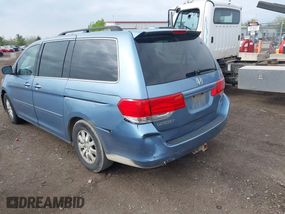 2009 Honda Odyssey EX-L with VIN 5FNRL386X9B048306, listed as a IAAI auction lot 42159882 with 189,623 mi miles. Bid and sale history available at carsss.com. Image 3.