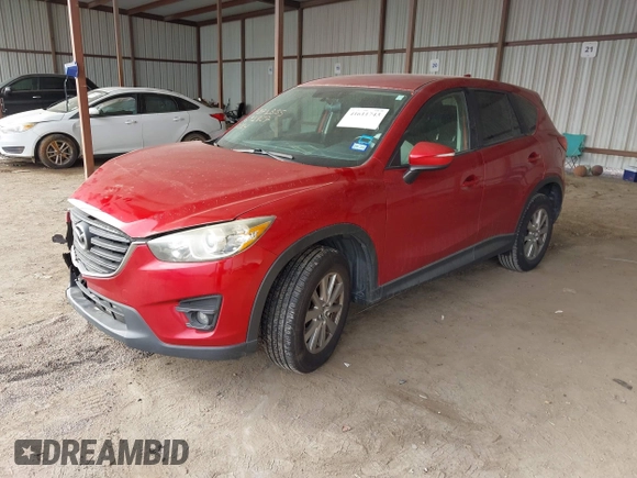 2016 Mazda CX-5 Touring with VIN JM3KE2CY0G0691927, listed as a IAAI auction lot 41611743 with 160,246 mi miles. Bid and sale history available at carsss.com. Image 17.