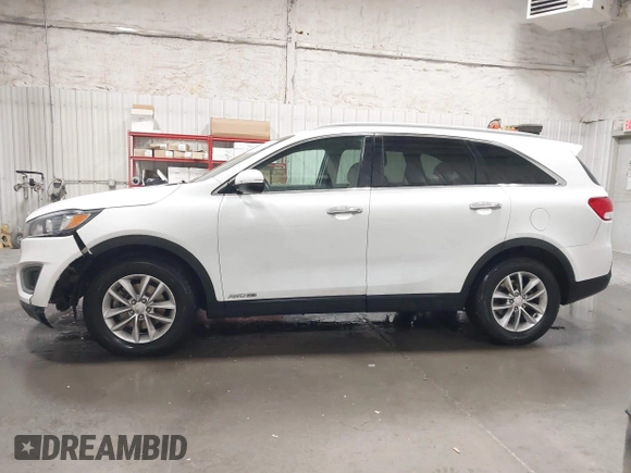 2016 Kia Sorento LX with VIN 5XYPGDA51GG047781, listed as a IAAI auction lot 42137935 with 103,386 mi miles. Bid and sale history available at carsss.com. Image 14.