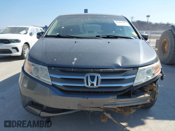 2012 Honda Odyssey EX-L with VIN 5FNRL5H69CB128585, listed as a IAAI auction lot 41695109 with 231,565 mi miles and . Bid and sale history available at carsss.com. Image 12.