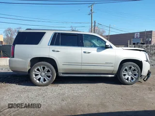 2016 GMC Yukon Denali with VIN 1GKS2CKJ5GR393269, listed as a IAAI auction lot 41963630 with 158,584 mi miles and . Bid and sale history available at DreamBid. Image 13.