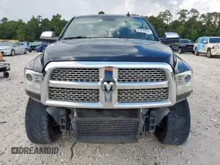 2014 Ram 2500 Laramie z VIN 3C6UR5FL4EG183158, wystawiony jako Copart lot #61846925 z przebiegiem 199 961 mil mil oraz Szkoda całkowita • Salvage title. Historia ofert i sprzedaży dostępna na DreamBid. Obrazek 5.