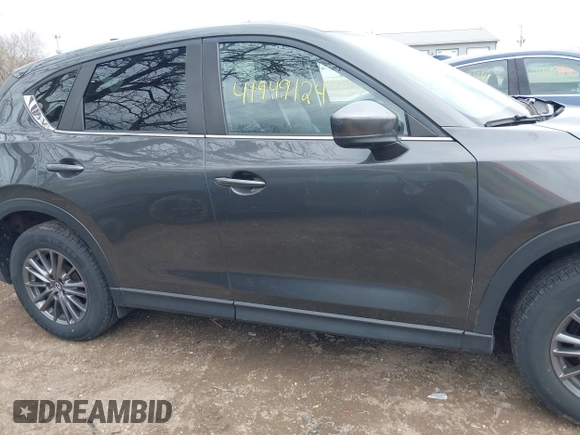 2020 Mazda CX-5 Touring with VIN JM3KFBCM1L0792396, listed as a IAAI auction lot 41949124 with 118,280 mi miles. Bid and sale history available at carsss.com. Image 13.