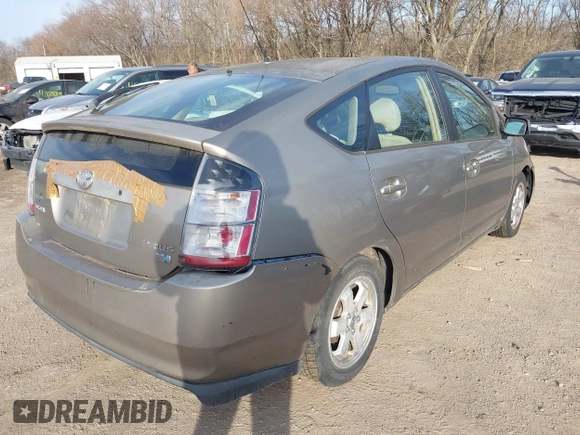 2005 Toyota Prius z VIN JTDKB20UX53056020, wystawiony jako IAAI lot #41829041 z przebiegiem 224 762 mil mil oraz . Historia ofert i sprzedaży dostępna na DreamBid. Obrazek 4.