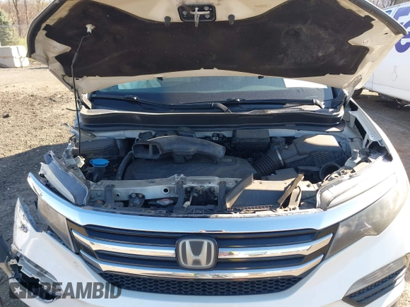 2016 Honda Pilot Touring with VIN 5FNYF6H98GB017079, listed as a IAAI auction lot 42055272 with 142,726 mi miles and . Bid and sale history available at DreamBid. Image 10.