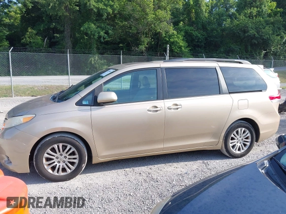 2011 Toyota Sienna XLE AAS with VIN 5TDYK3DC7BS008535, listed as a IAAI auction lot 42589645 with 208,624 mi miles and . Bid and sale history available at DreamBid. Image 14.