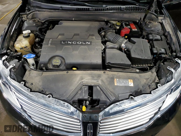 2014 Lincoln MKZ z VIN 3LN6L2JKXER819971, wystawiony jako Copart lot #49979115 z przebiegiem 132 602 mil mil oraz Szkoda całkowita • Salvage title. Historia ofert i sprzedaży dostępna na DreamBid. Obrazek 12.