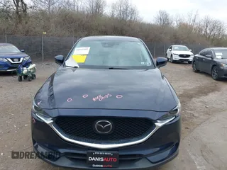 2021 Mazda CX-5 Grand Touring with VIN JM3KFADM0M1321375, listed as a IAAI auction lot 41913449 with 88,178 mi miles. Bid and sale history available at carsss.com. Image 13.
