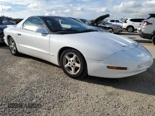 1997 Pontiac Firebird Firebird z VIN 2G2FS22K5V2232134, wystawiony jako Copart lot #74087964 z przebiegiem Nie podano mil oraz Szkody całkowita. Historia ofert i sprzedaży dostępna na DreamBid. Obrazek 4.