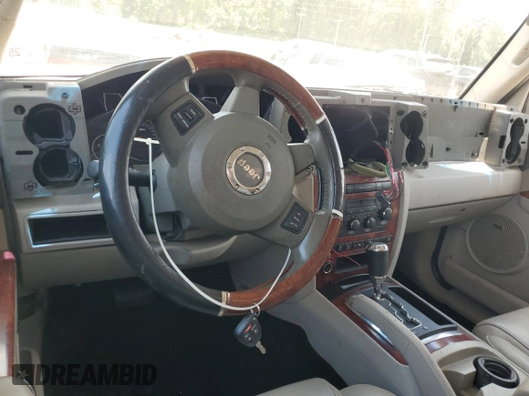2007 Jeep Commander Limited z VIN 1J8HH582X7C507939, wystawiony jako Copart lot #64052895 z przebiegiem Nie podano mil oraz Szkoda całkowita • Salvage title. Historia ofert i sprzedaży dostępna na DreamBid. Obrazek 8.