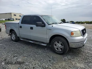 2005 Ford F-150 XLT with VIN 1FTRW12WX5FA79128, listed as a Copart auction lot 51963585 with 169,045 mi miles and Salvage Title. Bid and sale history available at carsss.com. Image 4.