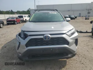 2023 Toyota RAV4 Hybrid XLE with VIN JTMRWRFV7PD166743, listed as a Copart auction lot 59964505 with 87,404 mi miles and Salvage title. Bid and sale history available at DreamBid. Image 5.