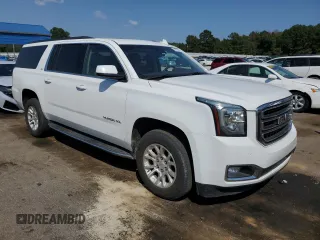 2019 GMC Yukon XL SLT with VIN 1GKS1GKCXKR239712, listed as a Copart auction lot 74721584 with 143,690 mi miles and Salvage Title. Bid and sale history available at carsss.com. Image 4.