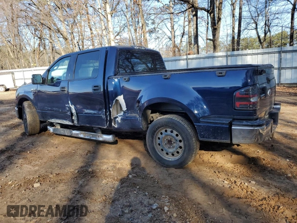 2007 Ford F-150 XLT with VIN 1FTPW02507KC10165, listed as a Copart auction lot 42901335 with 232,990 mi miles and Salvage title. Bid and sale history available at DreamBid. Image 2.