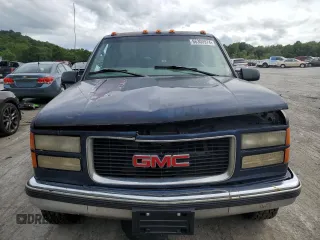 1999 GMC Suburban z VIN 1GKGK26J6XJ771768, wystawiony jako Copart lot #66300974 z przebiegiem 181 048 mil mil oraz Szkody całkowita. Historia ofert i sprzedaży dostępna na DreamBid. Obrazek 5.