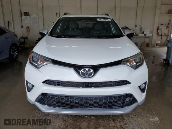 2016 Toyota RAV4 SE with VIN JTMJFREV0GD190302, listed as a Copart auction lot 59330345 with 102,069 mi miles and Salvage title. Bid and sale history available at DreamBid. Image 5.