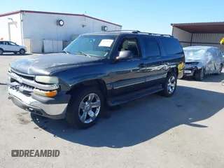 2003 Chevrolet Suburban LT z VIN 3GNFK16T43G175581, wystawiony jako IAAI lot #41584032 z przebiegiem Nie podano mil oraz . Historia ofert i sprzedaży dostępna na DreamBid. Obrazek 2.