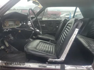 1965 Ford Mustang z VIN 5R07A205386, wystawiony jako Copart lot #63056335 z przebiegiem 80 491 mil mil oraz Szkoda całkowita • Salvage title. Historia ofert i sprzedaży dostępna na DreamBid. Obrazek 7.