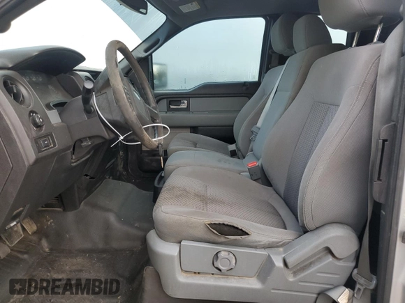 2014 Ford F-150 XL с VIN 1FTVX1EF6EKG10596, выставлен на аукционе Copart как лот 72131554 с пробегом 216 483 миль миль и Списание • Salvage title. История ставок и продаж доступна на DreamBid. Изображение 7.