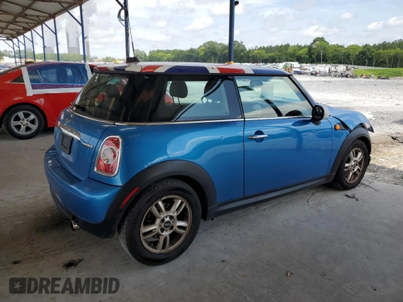 2011 MINI Hardtop with VIN WMWSU3C52BT252207, listed as a Copart auction lot 62735905 with 121,121 mi miles and Salvage title. Bid and sale history available at DreamBid. Image 3.