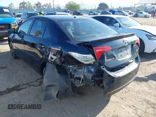 2019 Toyota Corolla L with VIN 5YFBURHE7KP922064, listed as a IAAI auction lot 41977741 with 54,896 mi miles and . Bid and sale history available at DreamBid. Image 3.