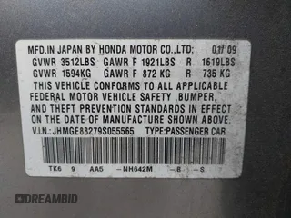 2009 Honda Fit with VIN JHMGE88279S055565, listed as a IAAI auction lot 41896359 with 184,618 mi miles. Bid and sale history available at carsss.com. Image 9.