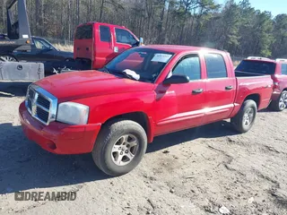 2005 Dodge Dakota SLT with VIN 1D7HW48N65S202948, listed as a IAAI auction lot 38573315 with 351,854 mi miles and . Bid and sale history available at DreamBid. Image 2.